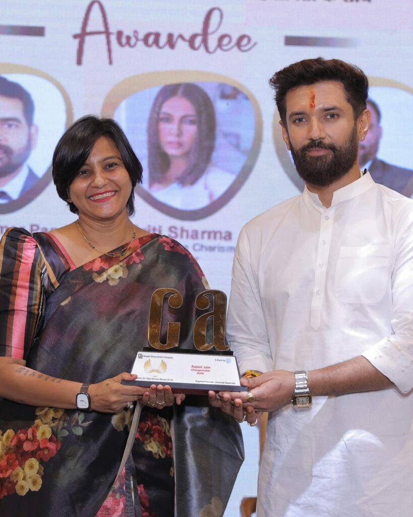 Rajani taking award from Chirag Paswan